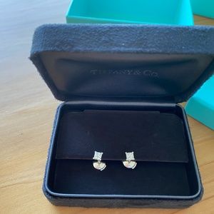 Tiffany .49 carat earrings. Beautiful like new. Originally 3200$